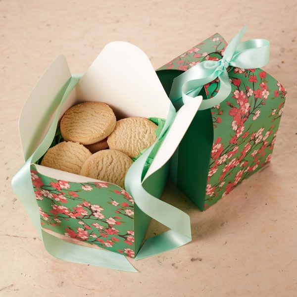 floral treat boxes with ribbons with curved lid green black red white